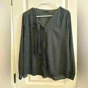 Woman’s black and white Zara blouse. Size small.